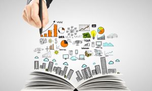 Libro abierto con íconos de marketing sobrepuestos en el aire; esto en referencia al marketing educativo.
