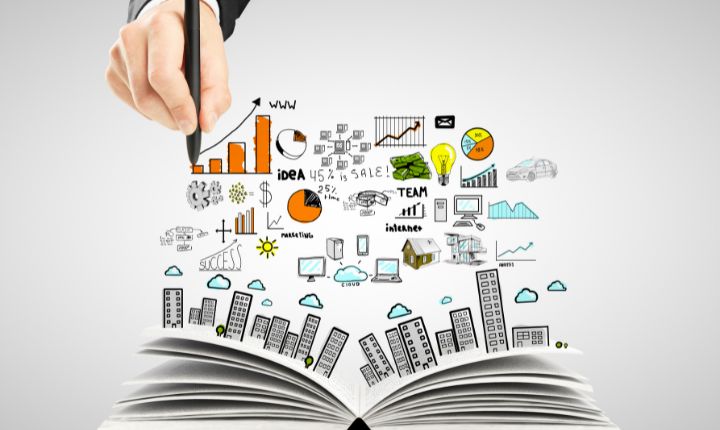 Libro abierto con íconos de marketing sobrepuestos en el aire; esto en referencia al marketing educativo.